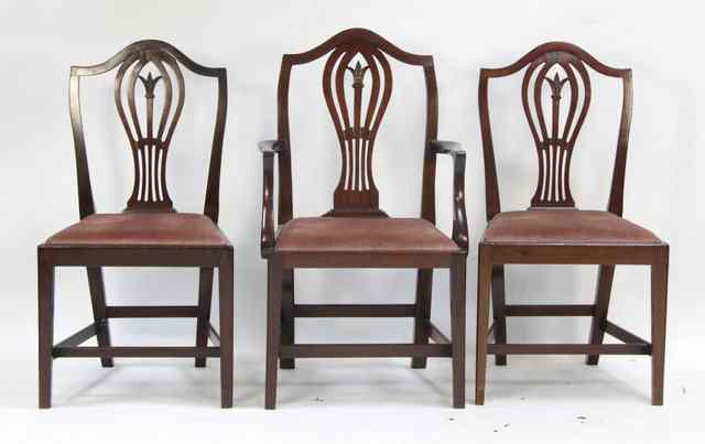 Appraisal: A set of eight mahogany dining chairs with pierced carved