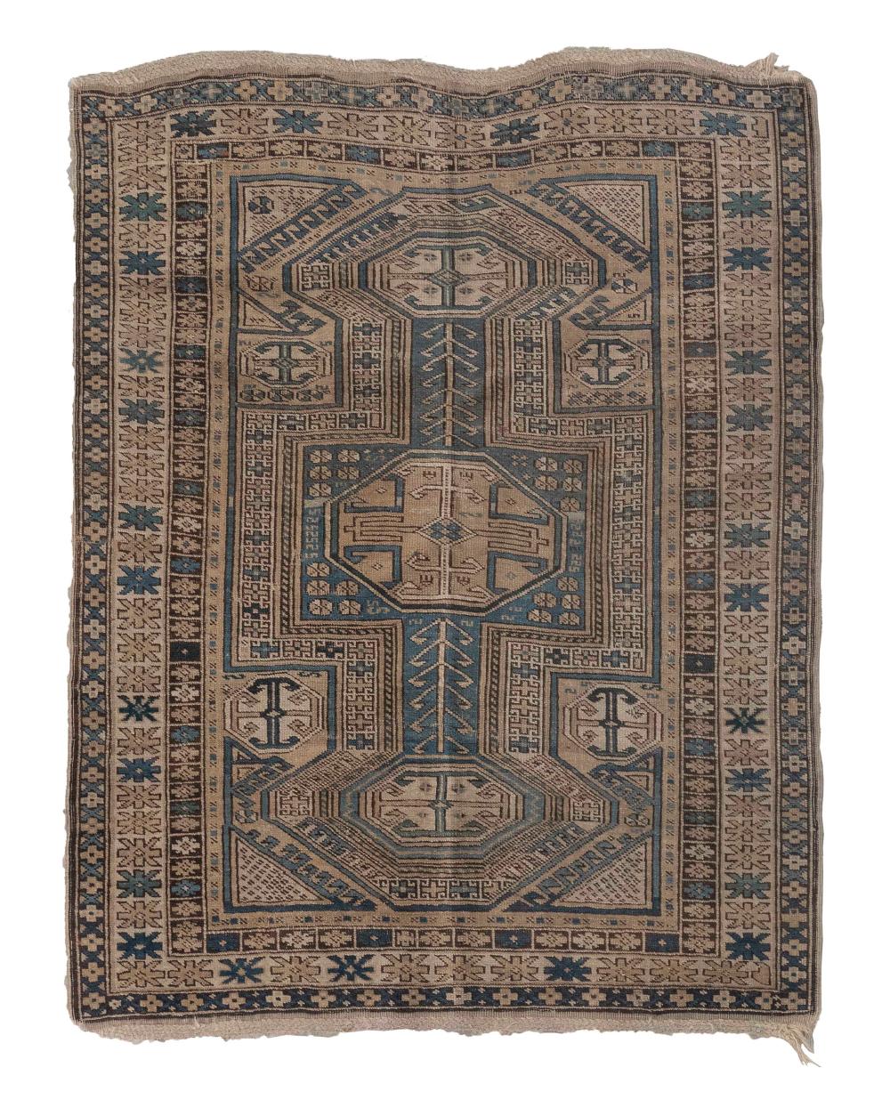 Appraisal: CAUCASIAN RUG X CAUCASIAN RUG ' X ' Faded ivory