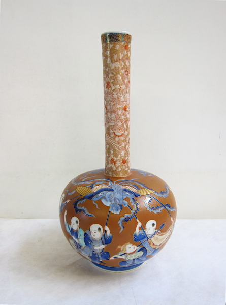 Appraisal: JAPANESE BOTTLE FORM VASE having hand painted enamel figures with