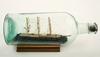 Appraisal: SHIP IN A BOTTLE - Three masted fully rigged gun