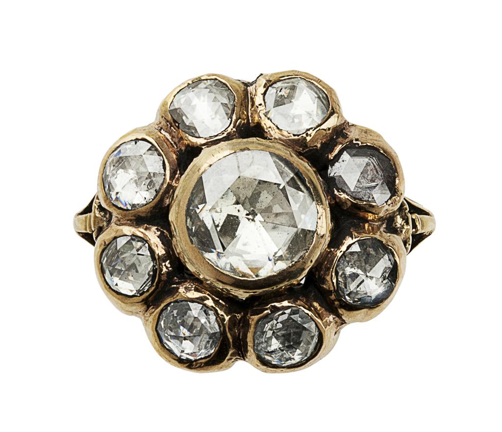 Appraisal: A mid th century diamond set cluster ring collet set