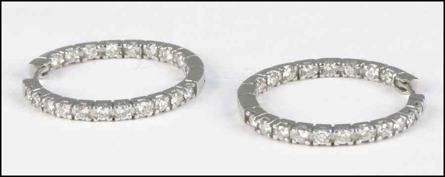 Appraisal: KARAT WHITE GOLD AND DIAMOND HOOP EARRINGS Diamonds are G-H