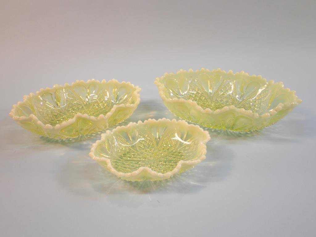 Appraisal: A graduated set of three Victorian vaseline glass dishes