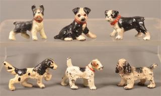 Appraisal: Hubley Painted Cast Iron Dog Party Favors Six Hubley Painted