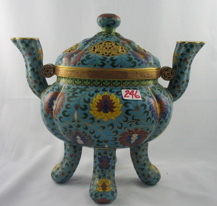 Appraisal: A CHINESE CLOISONNE ENAMELED CENSOR standing on four legs The