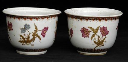 Appraisal: PAIR OF CHINESE FAMILLE ROSE CACHE-POTSEnameled with pink chrysanthemums and