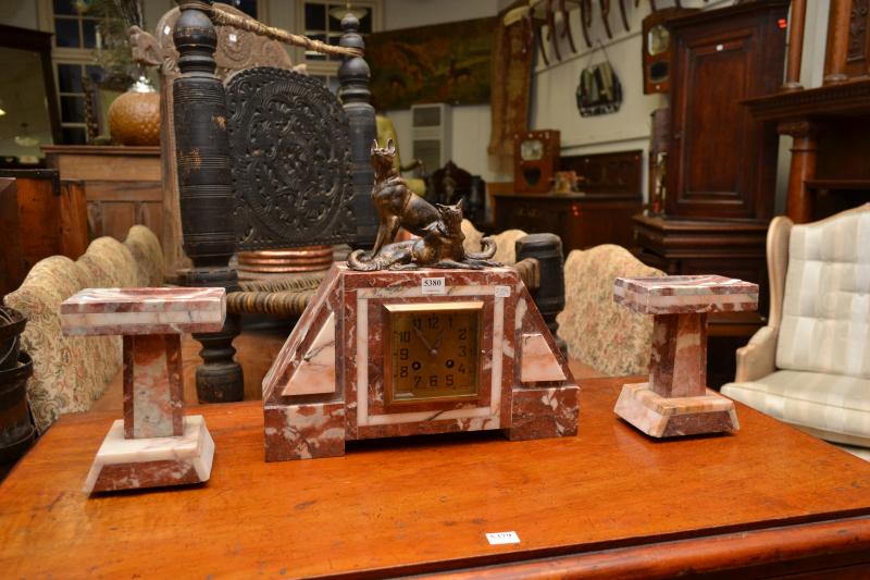 Appraisal: A FRENCH ART DECO MARBLE CLOCK FEATURING TWO DOGS SITTING