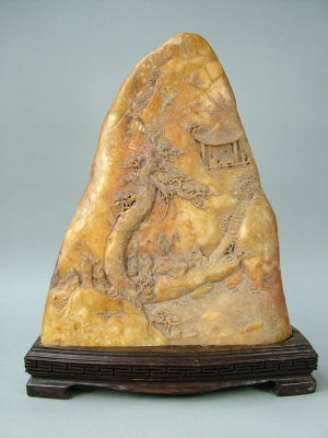 Appraisal: A large Chinese soapstone carving the piece of natural variegated