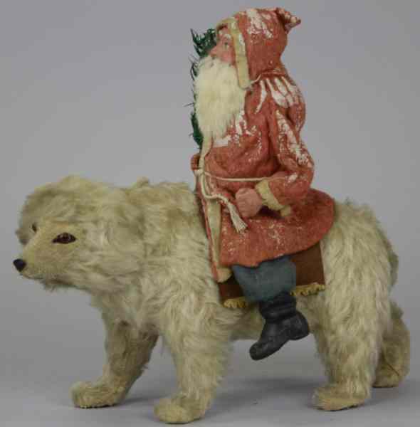 Appraisal: RARE SANTA RIDING POLAR BEAR CANDY CONTAINER Germany white mohair