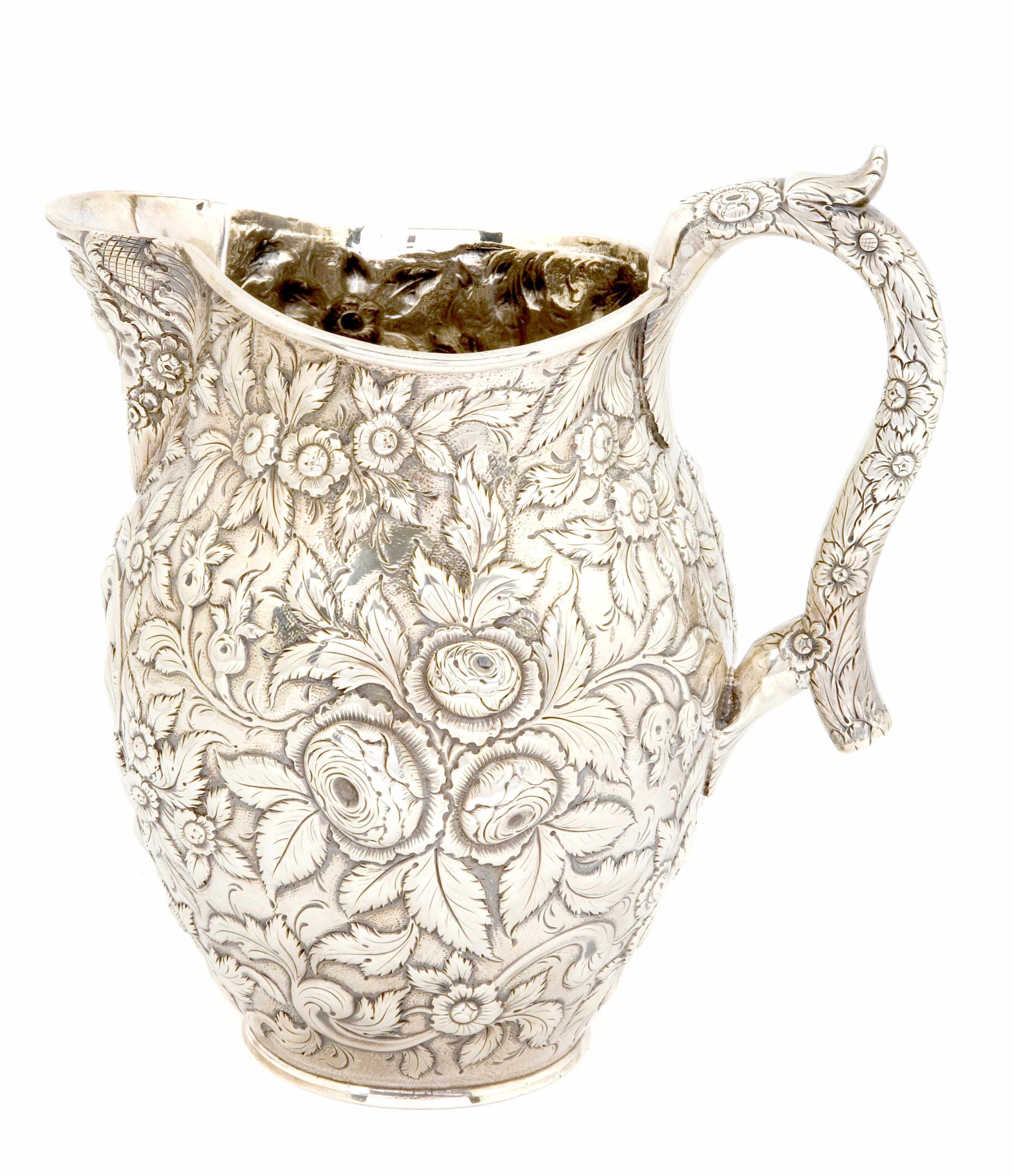 Appraisal: An S Kirk Son coin silver floral repousse pitcher Baltimore