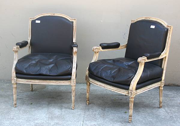 Appraisal: A pair of Louis XVI style painted fauteuils height in