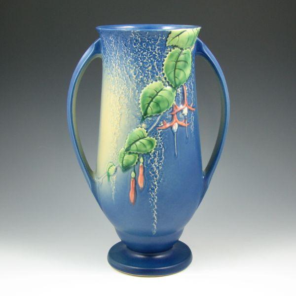 Appraisal: Roseville blue Fuchsia handled vase with good mold and color