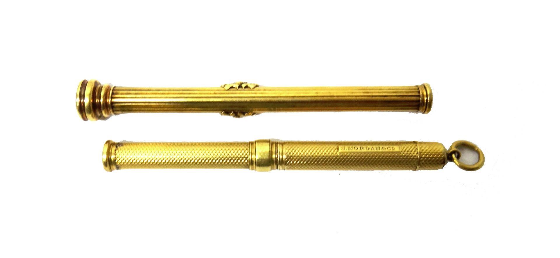 Appraisal: A gold cased slide action dip pen cum pencil with