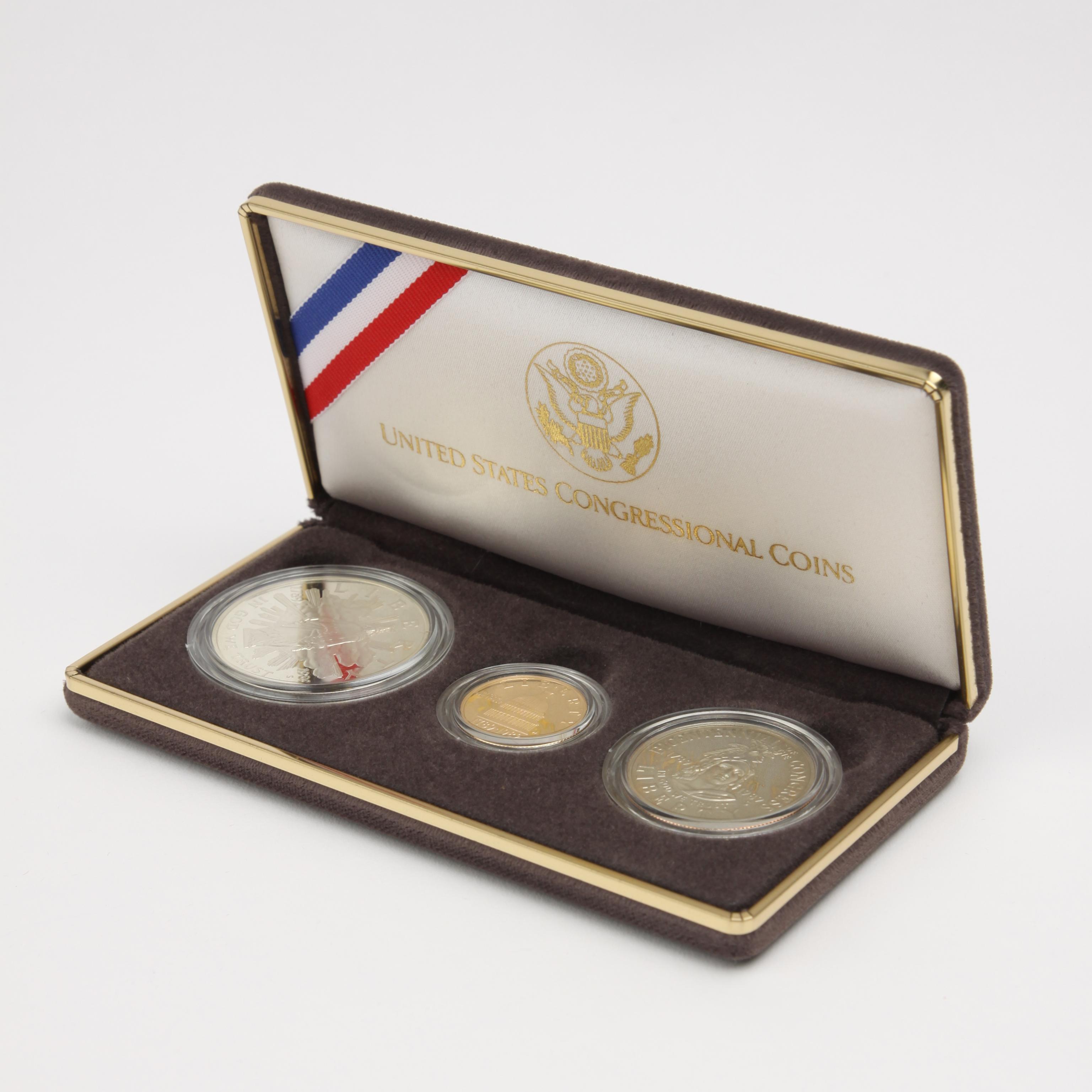 Appraisal: THREE US CONGRESSIONAL GOLD AND SILVER COINS Set of three