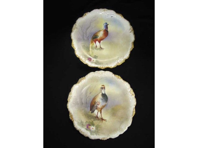 Appraisal: Pair of Limoges Porcelain Handpainted Plates pheasant decor gold trim