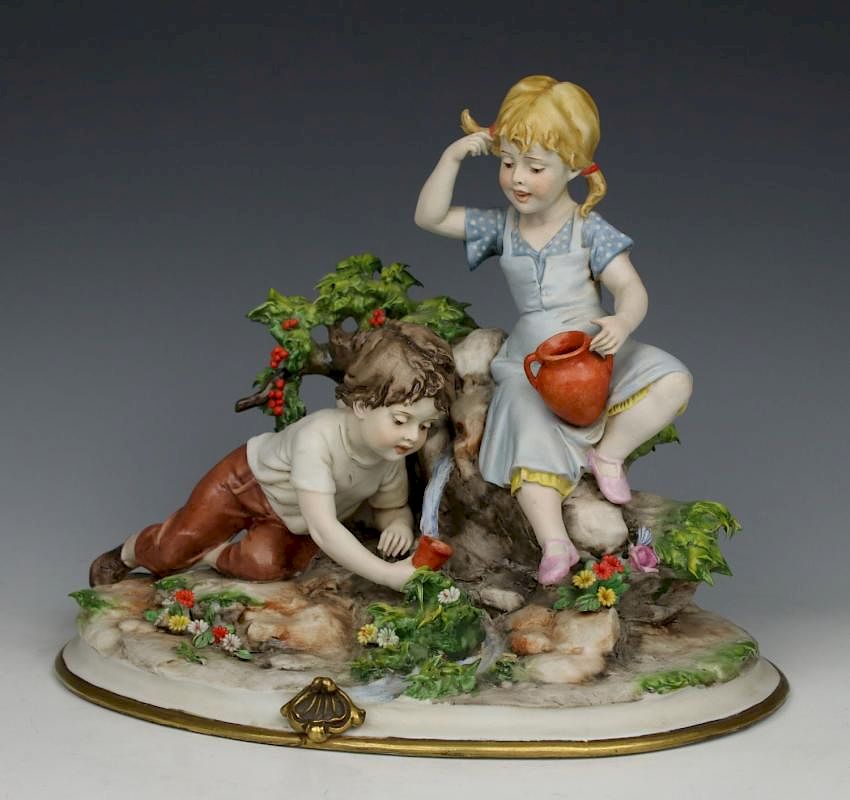 Appraisal: Capodimonte Benacchio Figurine Boy and Girls at Spring MANUFACTURE Triade