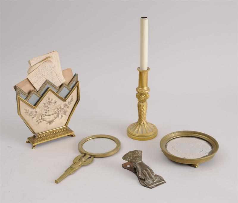 Appraisal: FOUR FRENCH GILT-METAL TABLE ARTICLES AND A BRASS CLIP Comprising