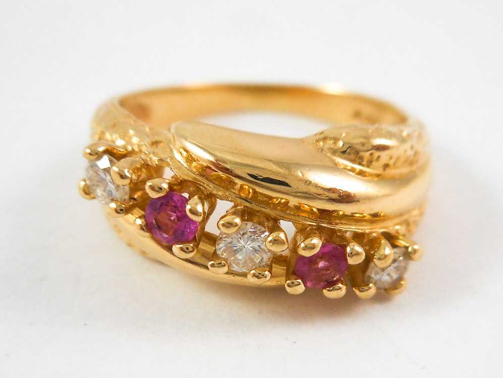 Appraisal: PINK TOURMALINE DIAMOND AND YELLOW GOLD RING The k gold