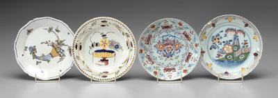 Appraisal: Four Delft shallow bowls all with polychrome floral decoration one