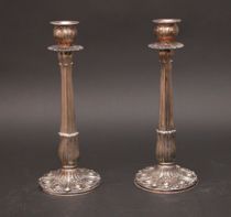 Appraisal: Art Nouveau Candlesticks Pair of silver plated candlesticks have a