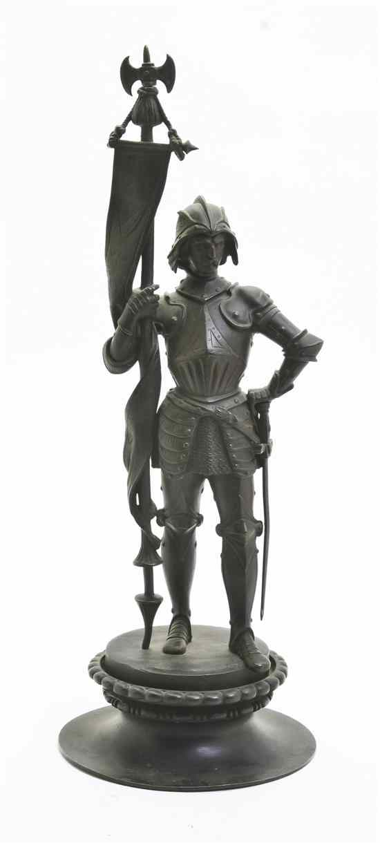 Appraisal: A Continental Patinated Bronze Knight depicted standing holding a flag