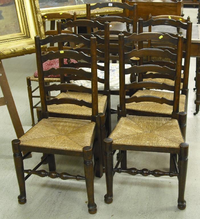 Appraisal: Set of five oak country ladderback chairs four single and