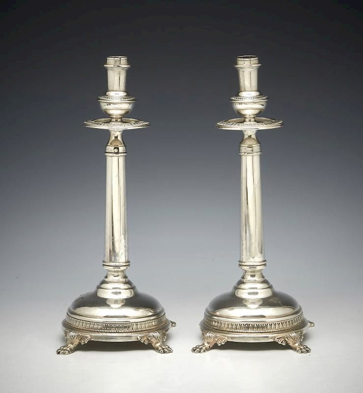 Appraisal: Pair of Peruvian sterling candlesticks Pair of Peruvian sterling candlesticks