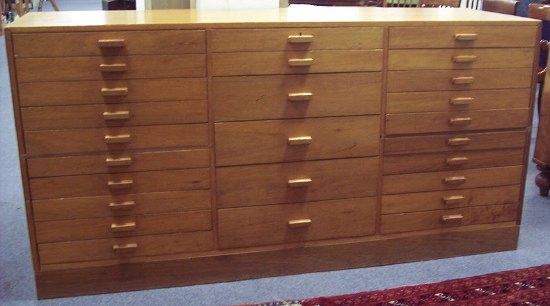 Appraisal: A modern oak chest of three banks of twenty-six drawers