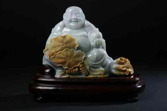 Appraisal: CHINESE CELADON AND CAF -AU-LAIT JADEITE FIGURE OF BUDAI -