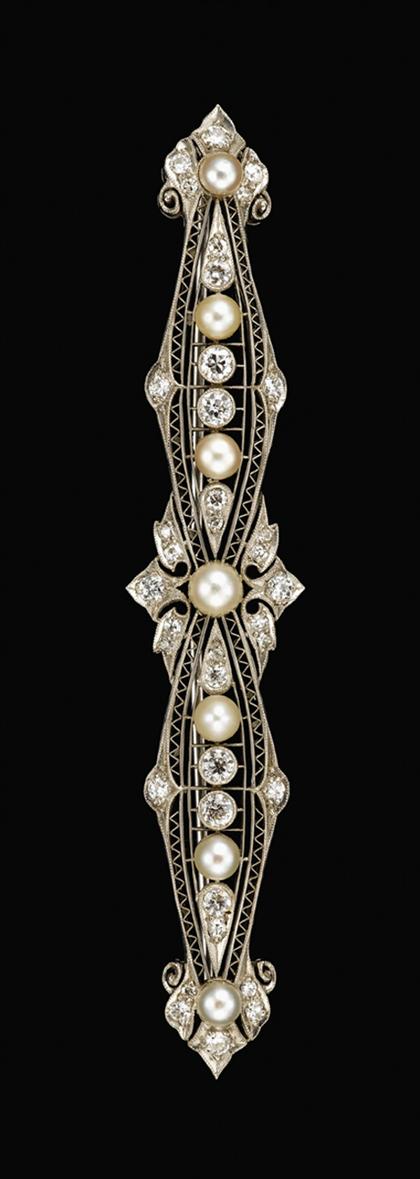 Appraisal: White gold filigree pearl and diamond bar pin Seven cream