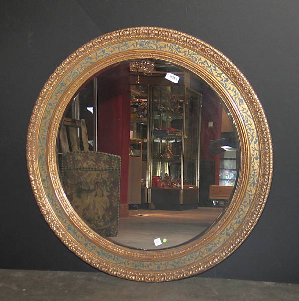 Appraisal: A Renaissance style parcel gilt mirror diameter in