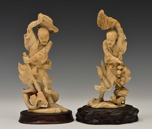 Appraisal: TWO JAPANESE WALRUS IVORY OKIMONOS a wood cutter with axe