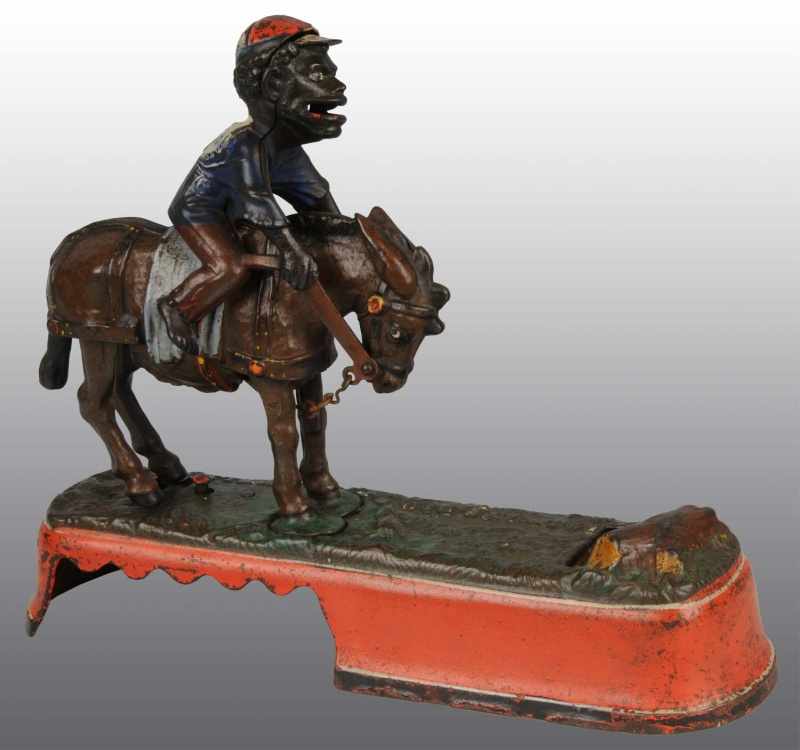 Appraisal: Cast Iron 'Spise A Mule Mechanical Bank Description Manufactured by