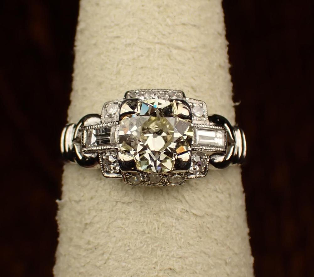 Appraisal: VINTAGE DIAMOND AND PLATINUM RING with ten round-cut diamonds and