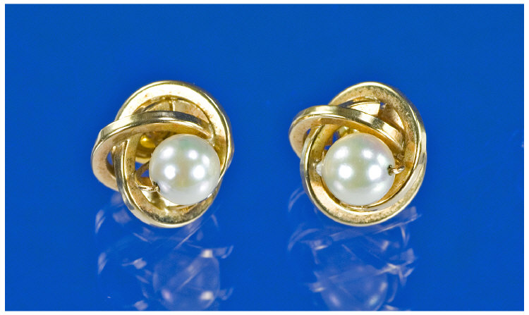 Appraisal: ct Gold Stud Earrings Set With A Single Pearl