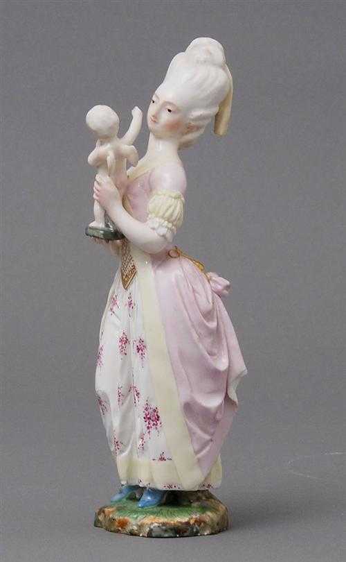 Appraisal: STATUETTE OF YOUNG LADY WITH CUPID Hoechst late th century