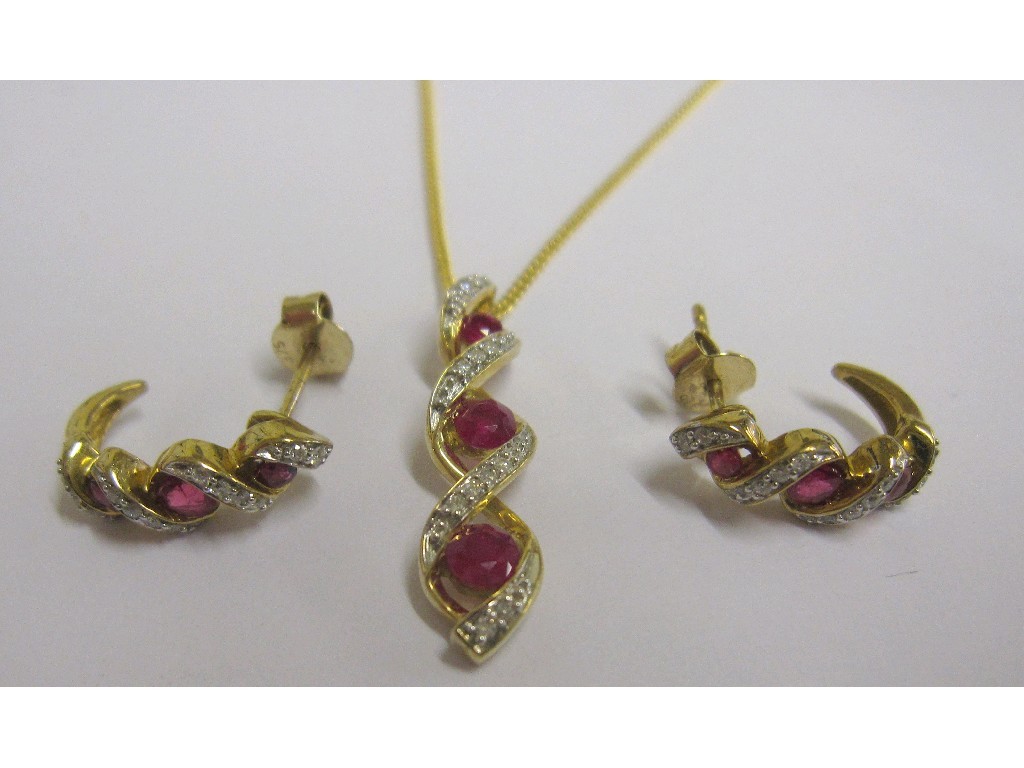 Appraisal: Nine carat gold ruby and diamond set pendant on ct