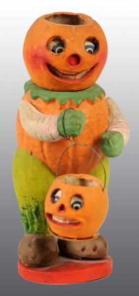 Appraisal: German Halloween Veggie Man Candy Container Description Painted composition Container