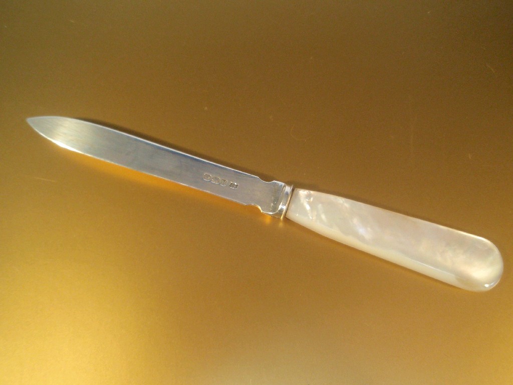 Appraisal: A silver fruit knife cased with mother of pearl handle