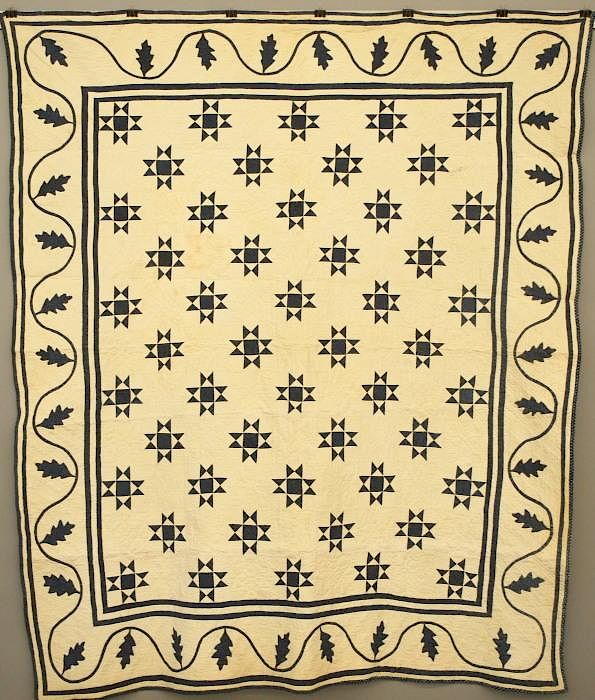 Appraisal: Star Oak Leaf patchwork quilt A late th-early th century