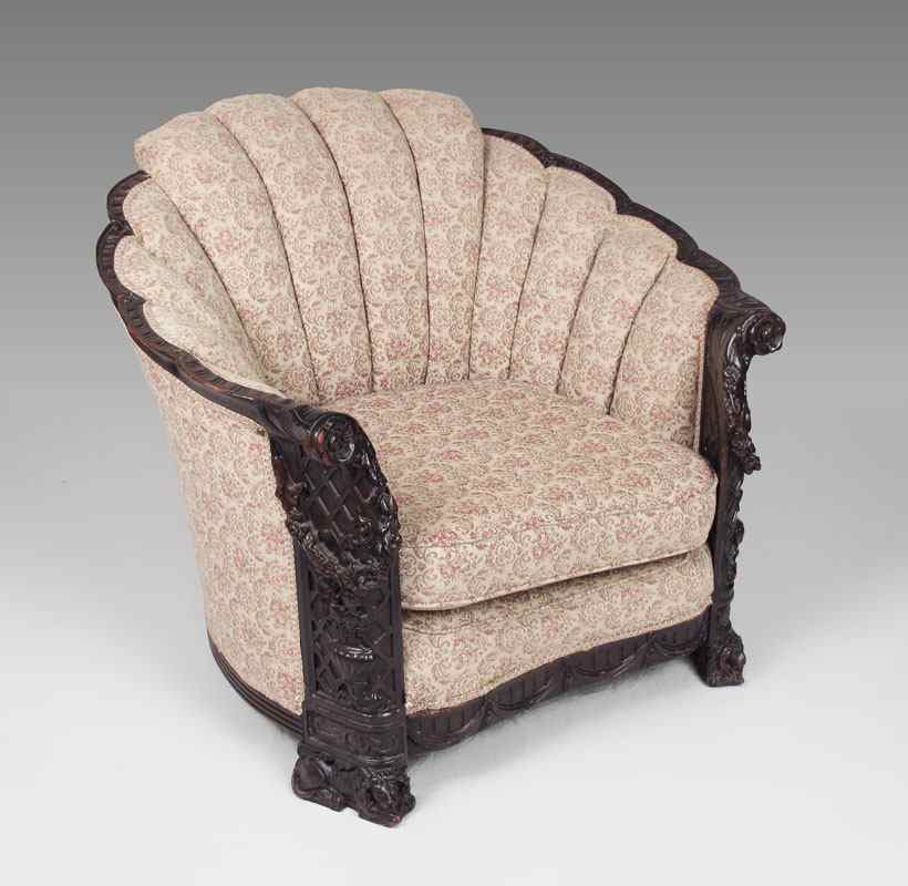 Appraisal: HEAVILY CARVED EARLY TH CENTURY CLUB CHAIR Carved and shaped