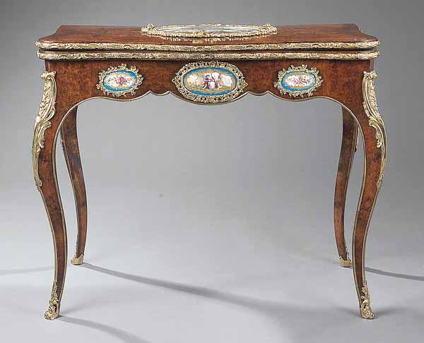 Appraisal: A Louis XV-Style Ormolu and S vres Mounted Amboyna Table