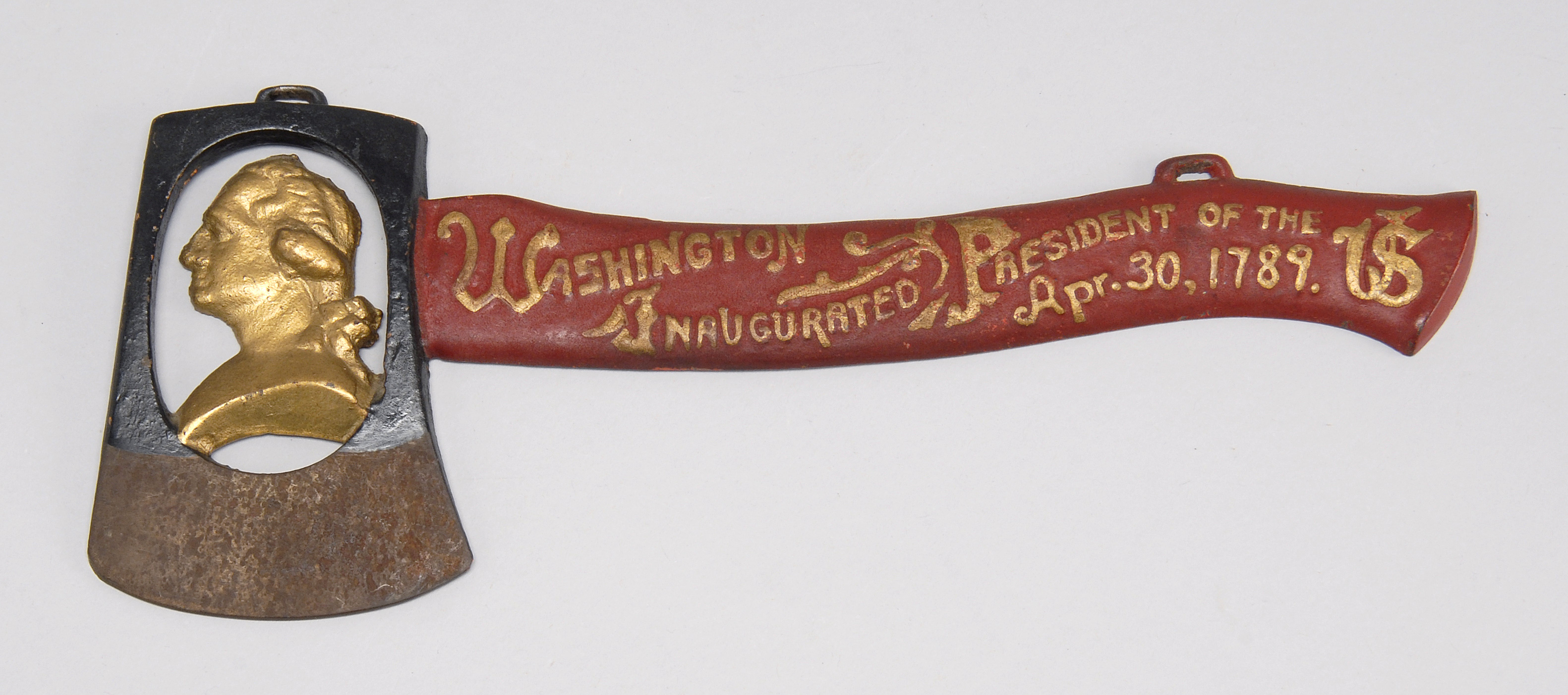 Appraisal: GEORGE WASHINGTON SOUVENIR AXE Gold-painted silhouette bust of Washington inside