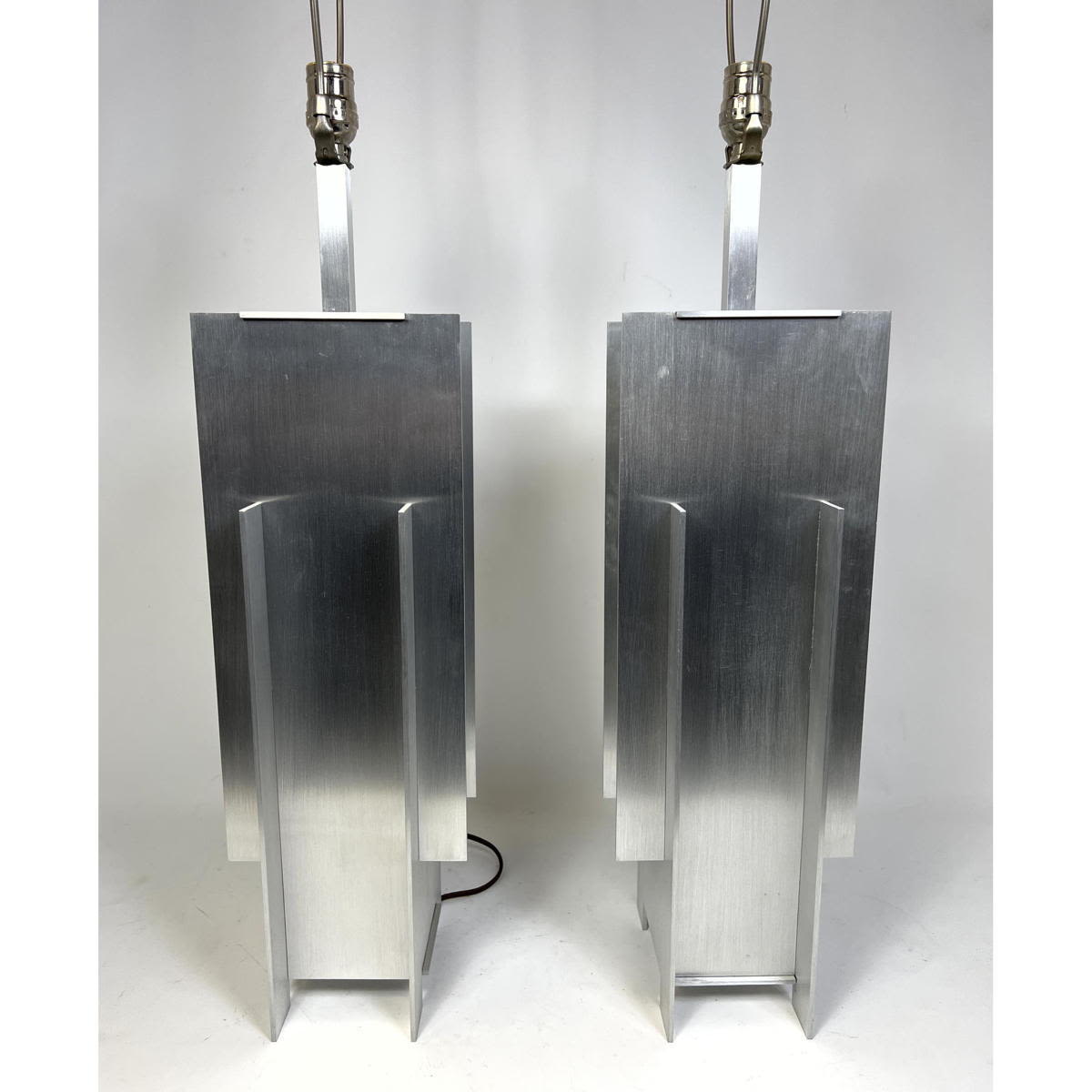 Appraisal: Pair of Machined Aluminum Machine Age Style Lamps Robert Sonneman