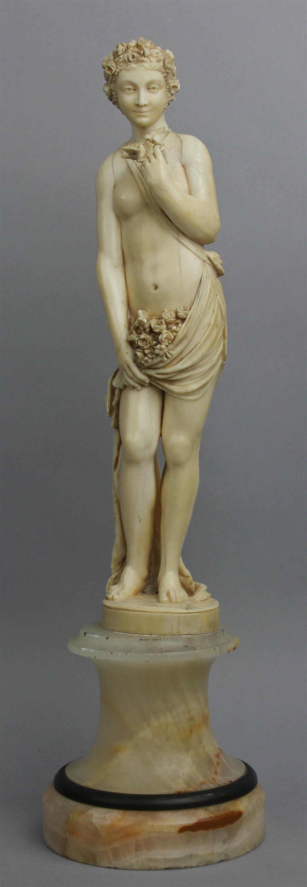 Appraisal: IVORY FIGURE OF A MAIDEN WITH BIRDS PROBABLY FRENCH DIEPPE