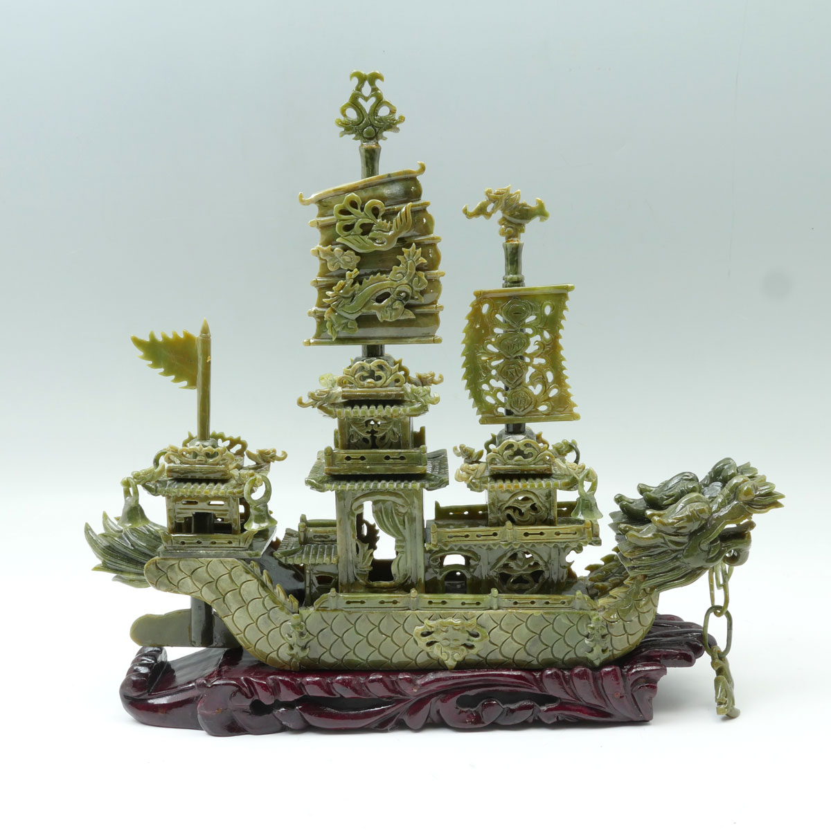 Appraisal: CARVED CHINESE JADE SHIP ON STAND Carved Chinese spinach jade