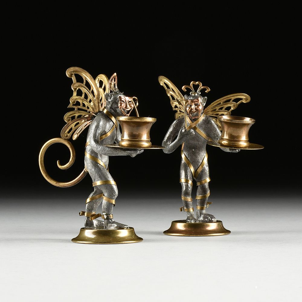 Appraisal: A PAIR OF MARDI GRAS CARNIVAL THEATRICAL BRASS AND LEAD