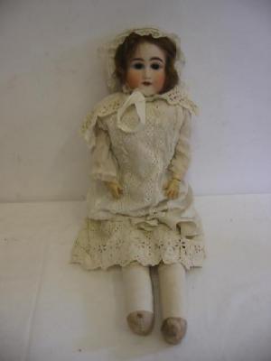 Appraisal: An early Kestner bisque shoulder head doll with brown sleeping