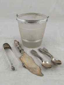 Appraisal: A frosted glass ice bucket with engraved staves and bands