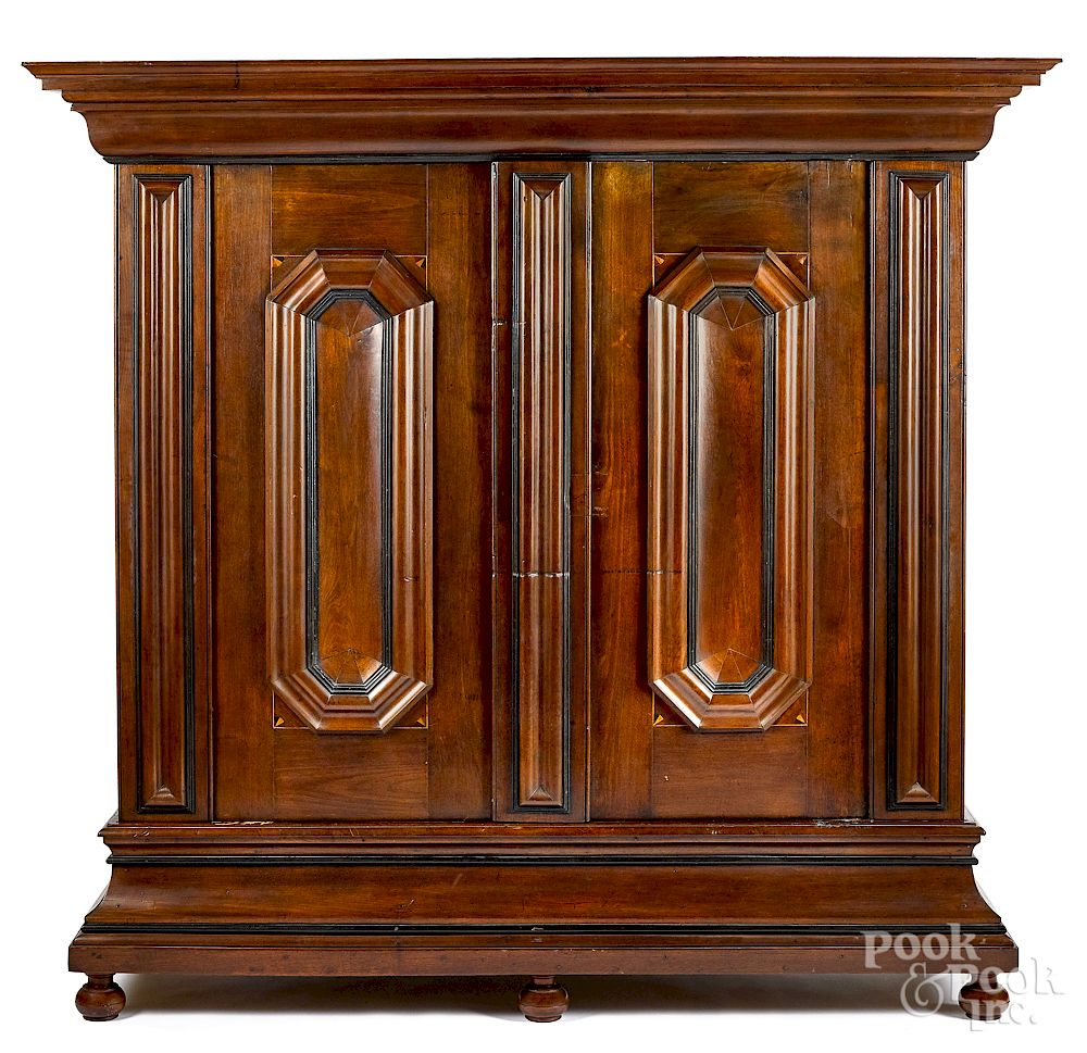 Appraisal: Pennsylvania walnut schrank Philadelphia Pennsylvania walnut schrank dated the bold